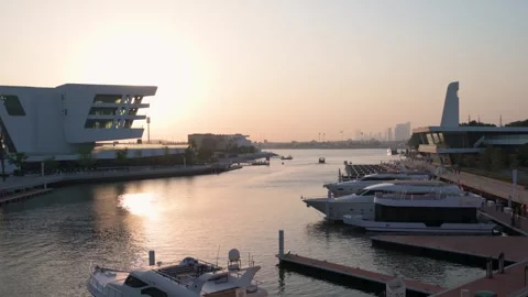 Sunset at Al Qana, a waterfront development in Abu Dhabi at Khor Al Maqta i.. Stock Footage 253978585