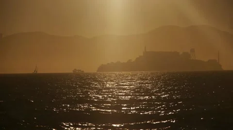 Sunset on Alcatraz With Boats on the Ocean Stock Footage 46559985