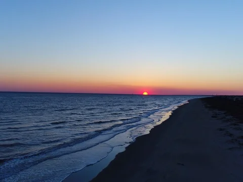 Sunset along the Beach Shore Stock Footage 73597821