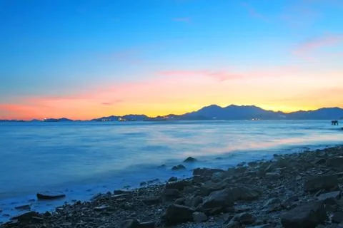Sunset along the coast Stock Photos