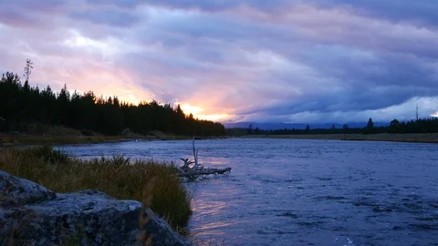 Sunset along the Madison River in Yellowstone National Park (Wyoming). Stock Footage 122689280