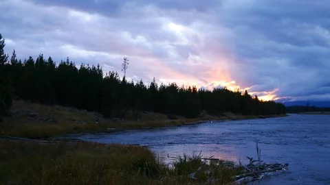 Sunset along the Madison River in Yellowstone National Park (Wyoming). Stock Footage 122689421
