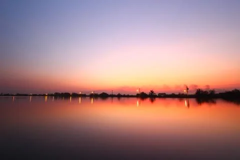 Sunset along the pond Stock Photos