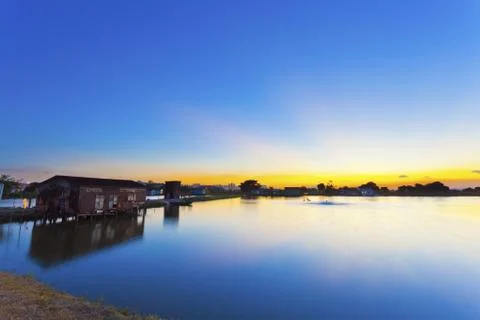 Sunset along the pond Foto stock