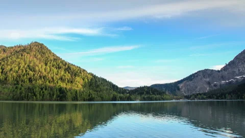 Sunset on an alpine lake Ritsa spring. Abkhazia. Full HD Stock Footage 95001731