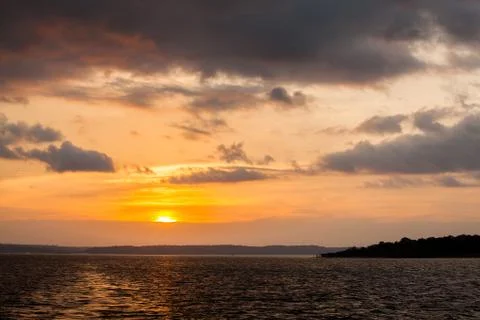 Sunset on Amazon river Stock Photos