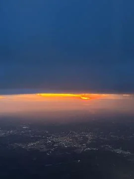 Sunset among clouds Stock Photos