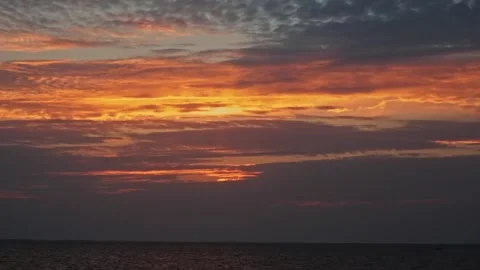 Sunset among the clouds on the river. Overcast summer evening Stock Footage 258010682