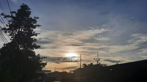 Sunset among the misty clouds 01 Stock Photos