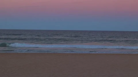 Sunset &amp;amp; waves at beach Gold Coast  Stock Footage 138192693