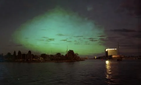 Sunset on Amsterdam harbor Stock Photos
