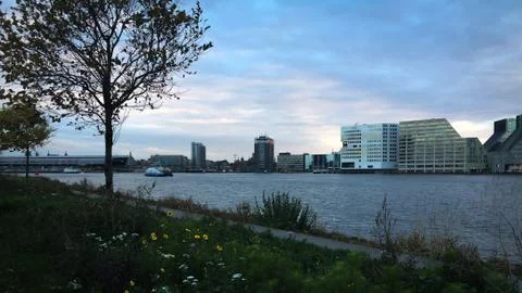 Sunset on Amsterdam harbor Stock Photos