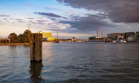 Sunset on Amsterdam harbor Stock Photos