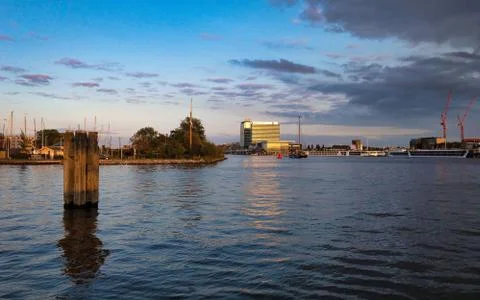 Sunset on Amsterdam harbor Stock Photos