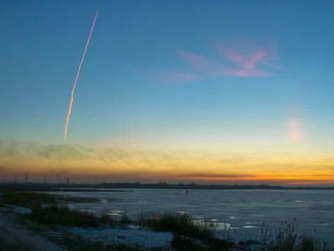 Sunset and airplane Stock Photos
