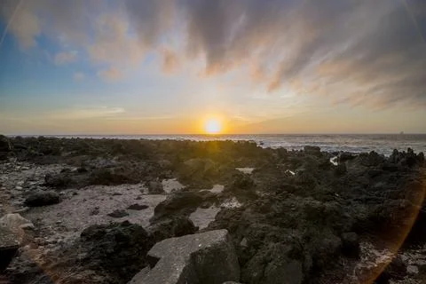 Sunset and Atlantic Ocean view at Faja Grande, Azores, the westernmost sett.. Stock Photos