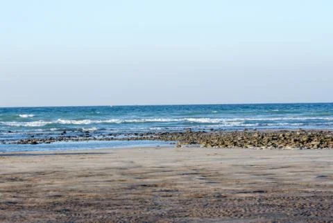 Sunset and beach Empty tropical beach background. Horizon with sky and white Stock Photos