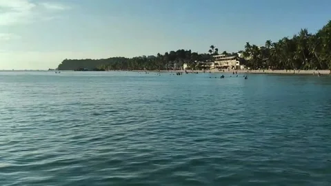 Sunset and beach from ocean Video stock 217429151