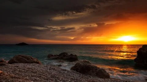 Sunset and beach Stock Photos