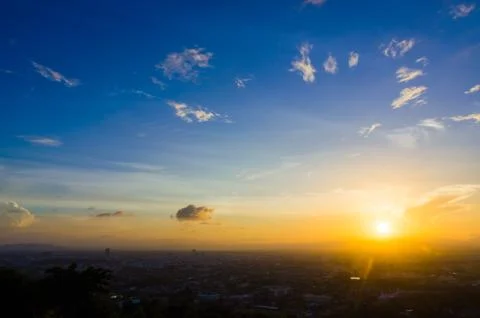 Sunset and blue sky Stock Photos