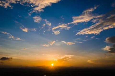 Sunset and blue sky Stock Photos