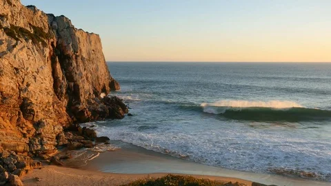 Sunset and breaking waves, Praia do Beliche, Portugal Stock Footage 87208852