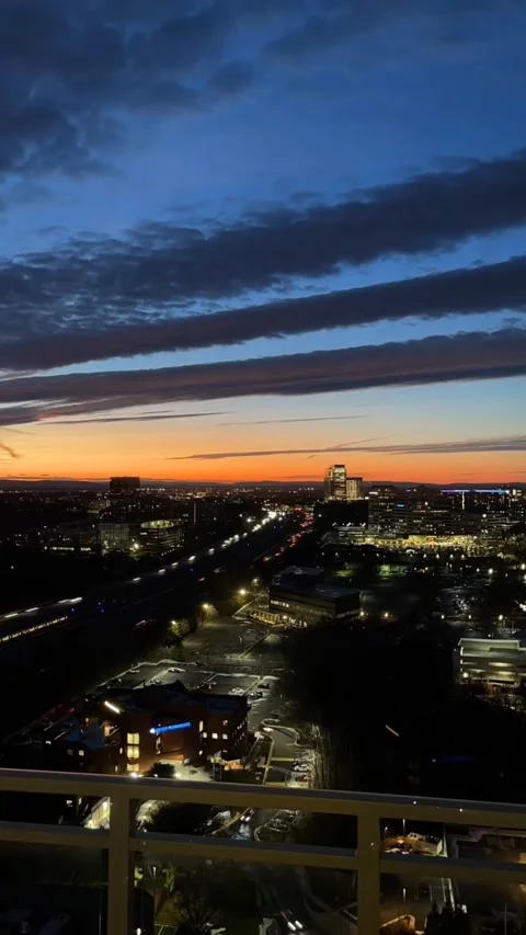 SUNSET AND CITY Video stock 168940641