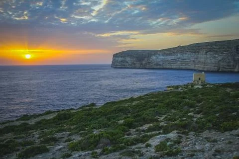 Sunset and the cliffs of Gozo Photos