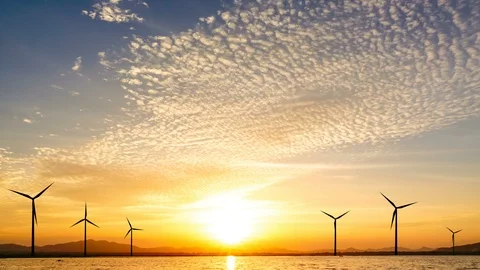 Sunset and cloud sky time lapse with wind turbine. 4K resolution video Stock Footage 92785867