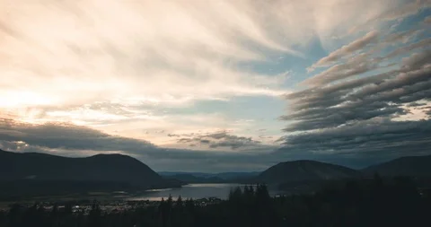 Sunset and Cloud Time lapse Over Mountains, lake and a Small Town Stock Footage 92053293