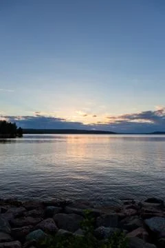 Sunset and clouds on a harbor Stock Photos