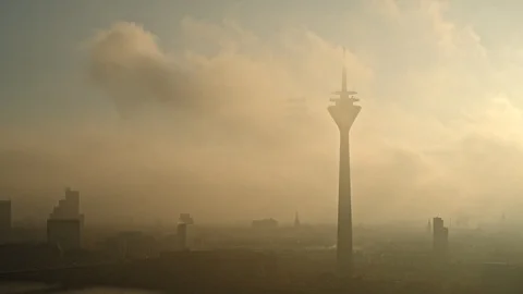 Sunset and clouds over Rhine Tower, Duesseldorf, North Rhine-Westphalia, Germany Stock Footage 129249711