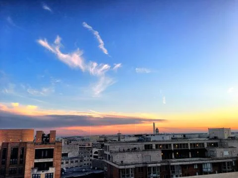 Sunset and clouds over the washington monument at dawn Stock Photos
