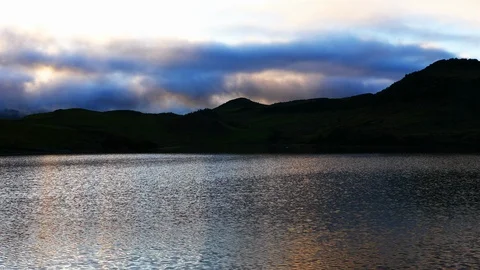 Sunset and clouds passing over Mount Pico Lagoon - Azore Stock Footage 116468746