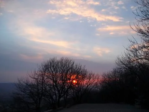 Sunset and the clouds Stock Photos