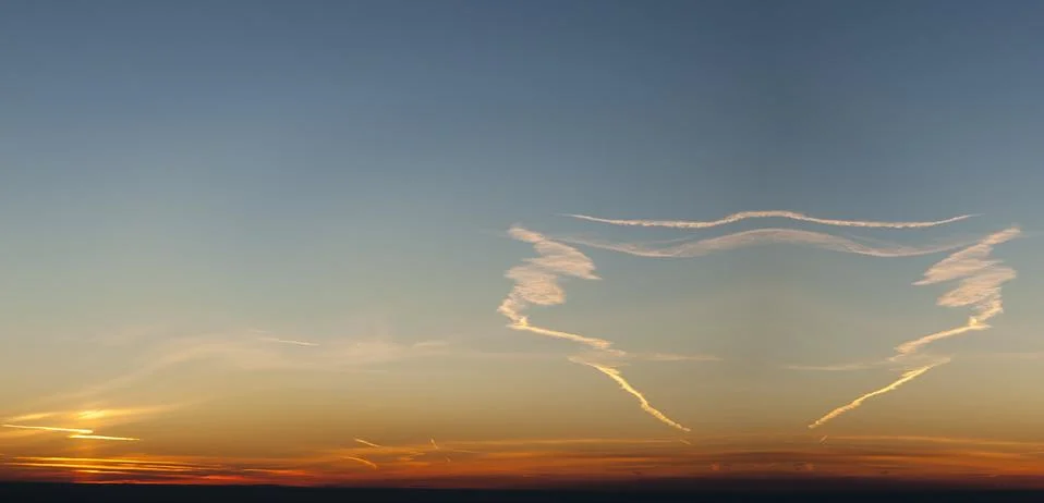 Sunset and clouds Stock Photos