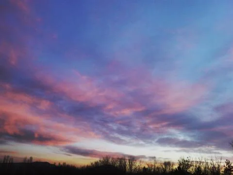 Sunset and the clouds Stock Photos