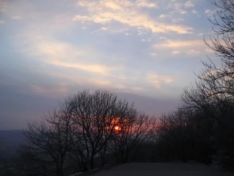 Sunset and the clouds Stock Photos