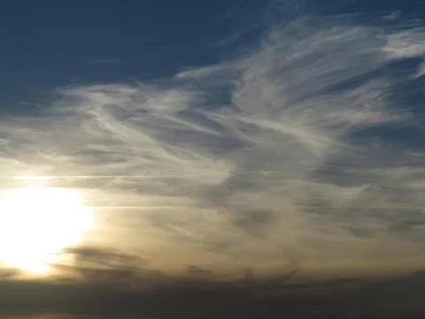 Sunset and clouds Stock Photos