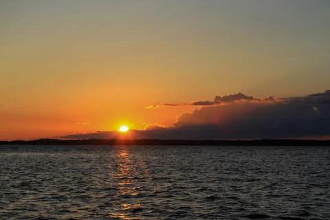Sunset and clouds Stock Photos