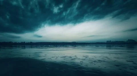 Sunset and clouds on the river, horror Stock Photos