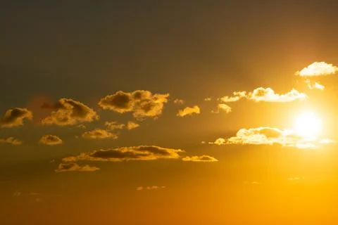 Sunset and clouds. Sunset or sunrise background photo. Stock Photos