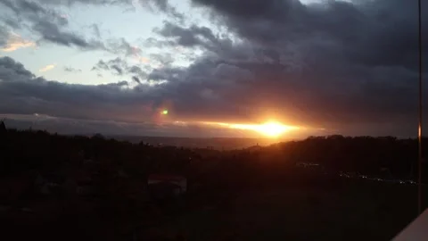 Sunset and dark clouds, forest is slightly visible Stock Footage 293467983
