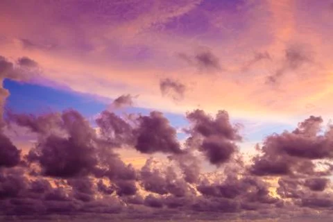 Sunset and dark clouds. Stock Photos