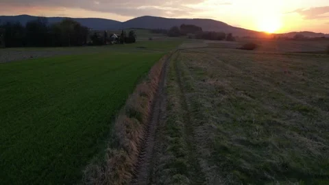 Sunset and a dirt road Stock Footage 306848310