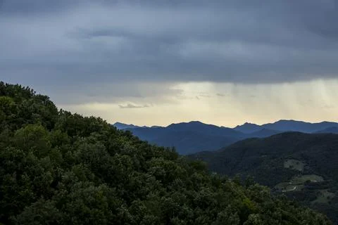 Sunset and dramatic clouds in La Garrotxa, Spain 스톡 사진