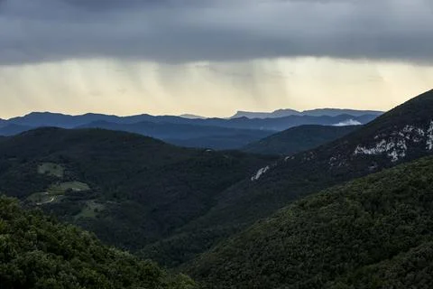 Sunset and dramatic clouds in La Garrotxa, Spain Photos