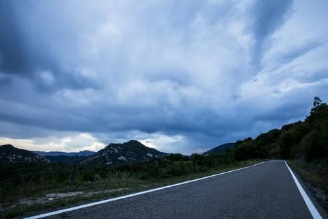 Sunset and dramatic clouds in La Garrotxa, Spain Photos
