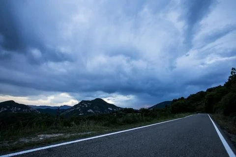 Sunset and dramatic clouds in La Garrotxa, Spain Photos