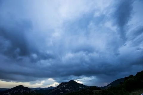 Sunset and dramatic clouds in La Garrotxa, Spain Photos